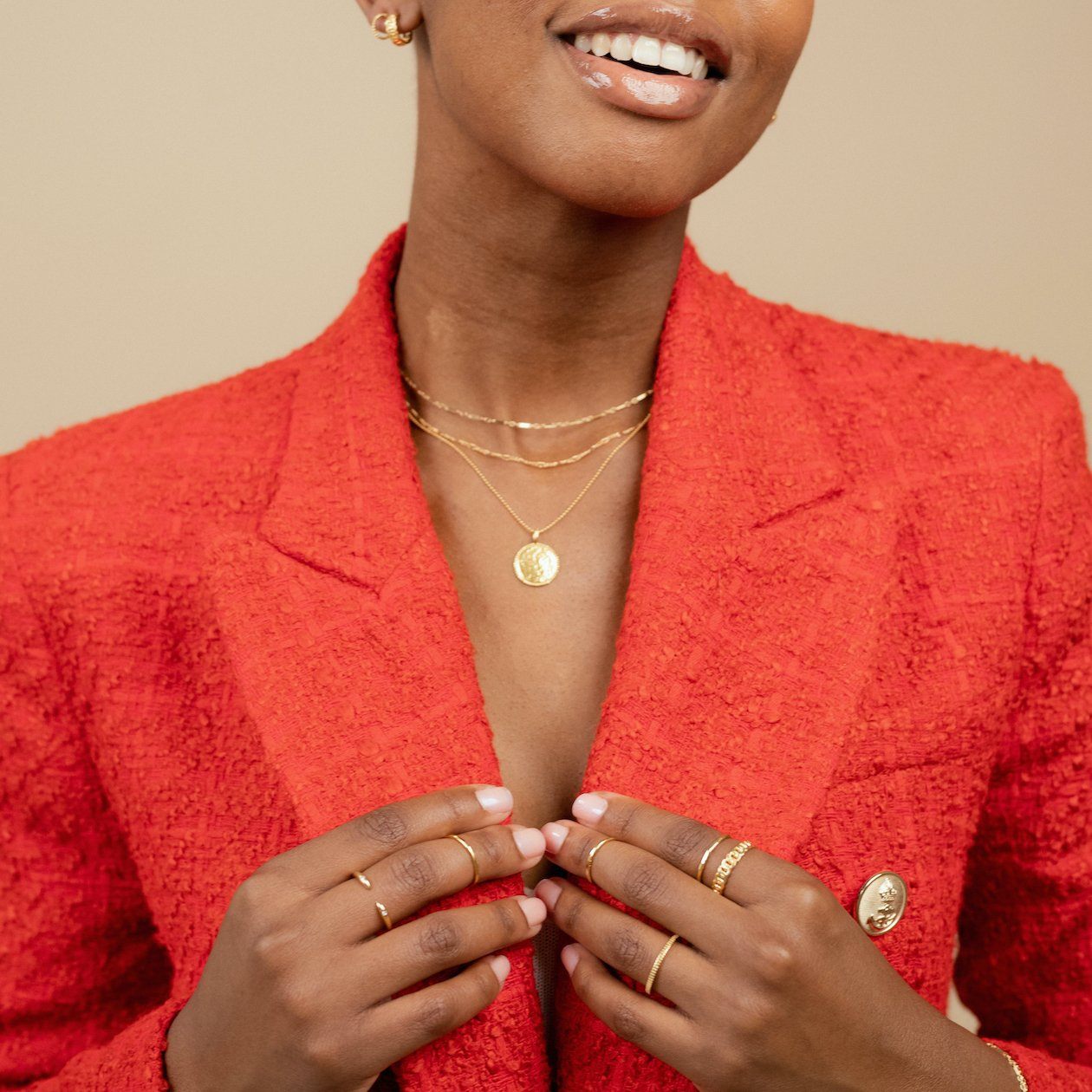 Model wearing the dainty gold Beaded Coin Necklace, Linked Choker, Figaro Chain Choker, Figaro Chain Ring, Coin Ring, Hammered Band Ring, Claw Ring, Hoop Earring Set, Katie Dean Jewelry