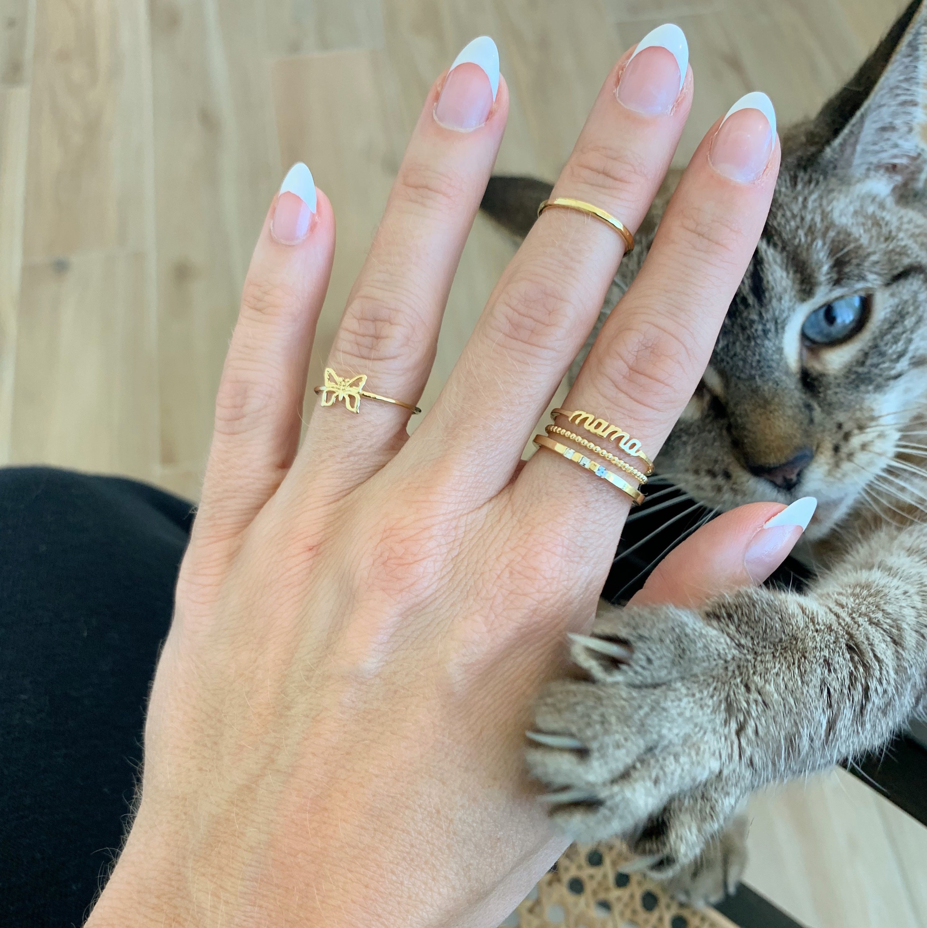 Dainty gold Mama Ring perfect for a delicate ring party, gold and minimal made in America by Katie Dean Jewelry with a french manicure and a cute cat