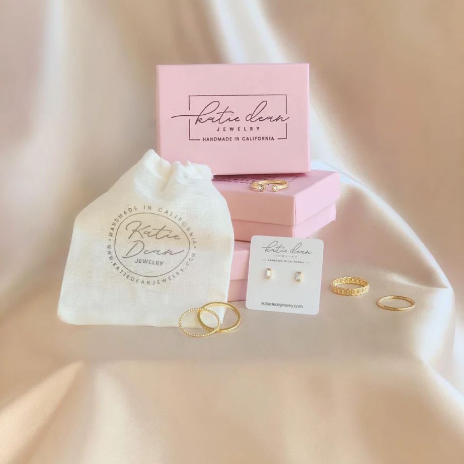 Katie Dean Jewelry branded drawstring pouch and boxes