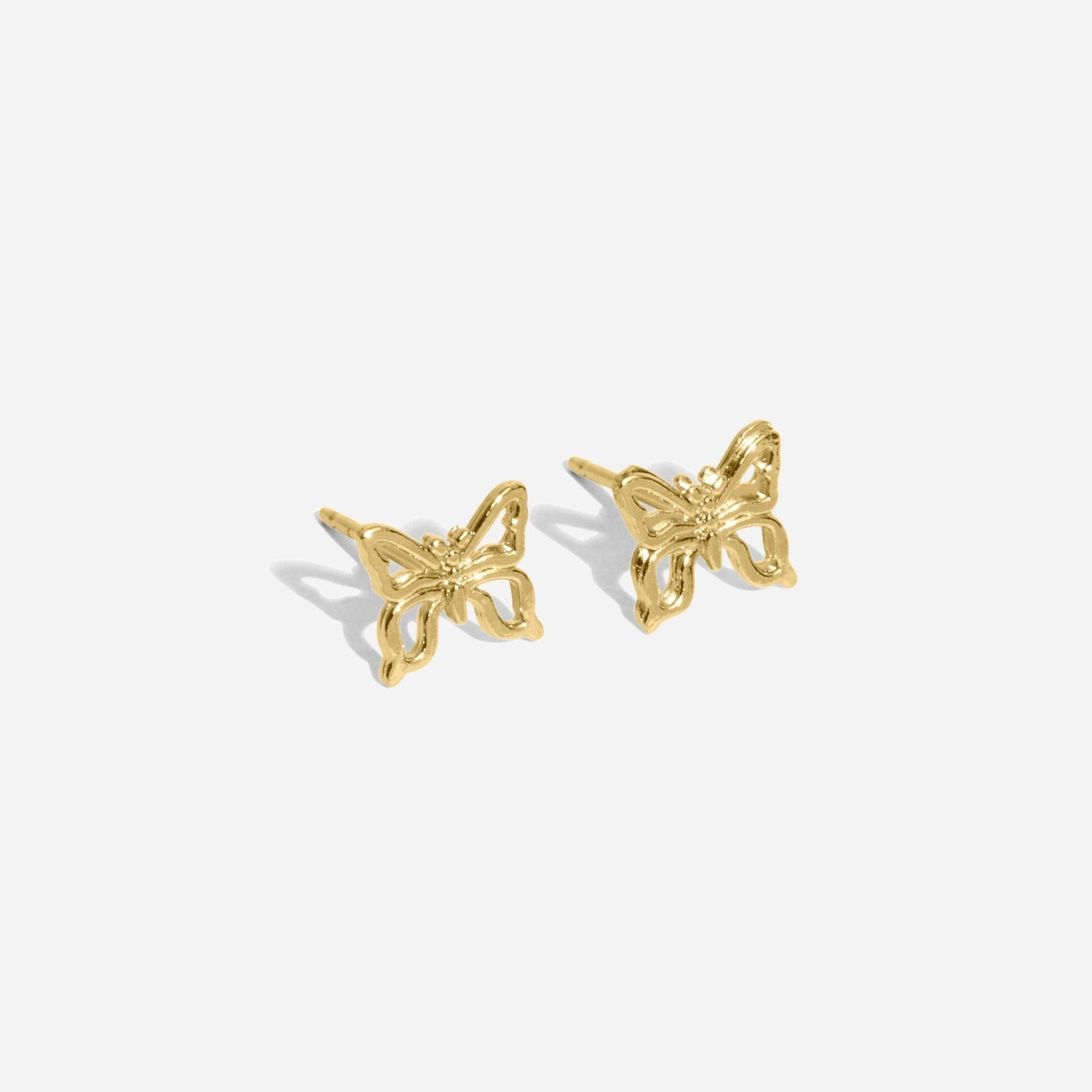 Dainty gold Butterfly Studs handmade in America by Katie Dean Jewelry, as seen on a natural white background, earrings made nickel-free and perfect for the dainty minimal jewelry lovers.
