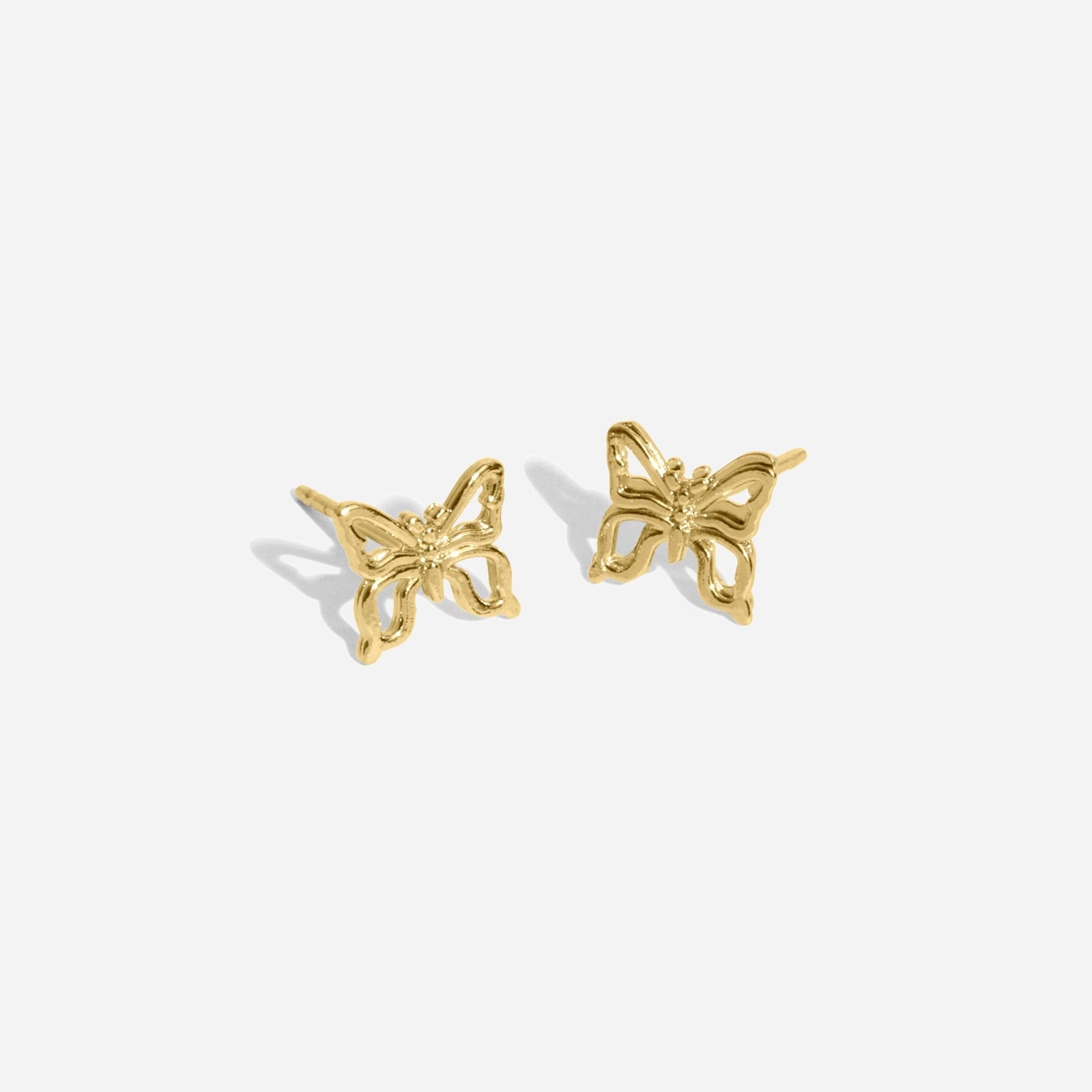 Dainty gold Butterfly Studs handmade in America by Katie Dean Jewelry, as seen on a natural white background, earrings made nickel-free and perfect for the dainty minimal jewelry lovers.
