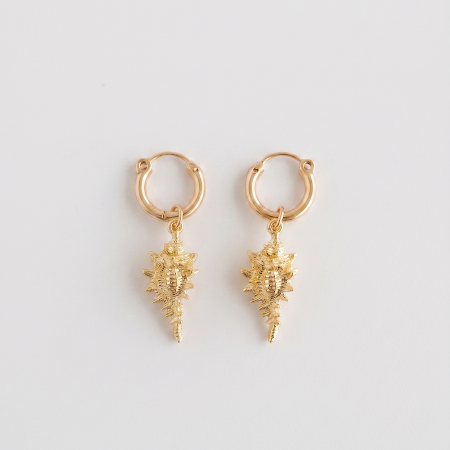 gold hoop earrings with detailed conch shell charms
