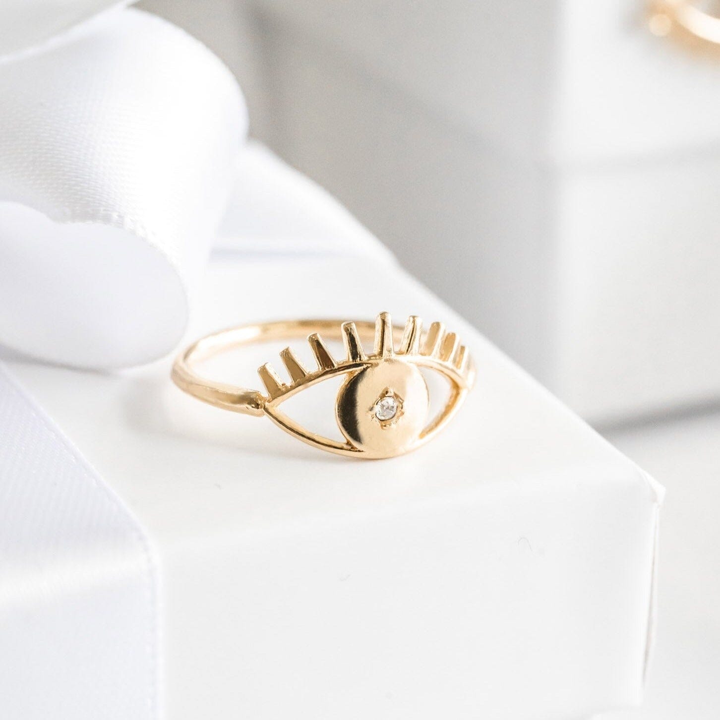 Dainty gold Evil Eye Ring made in America by Katie Dean Jewelry.