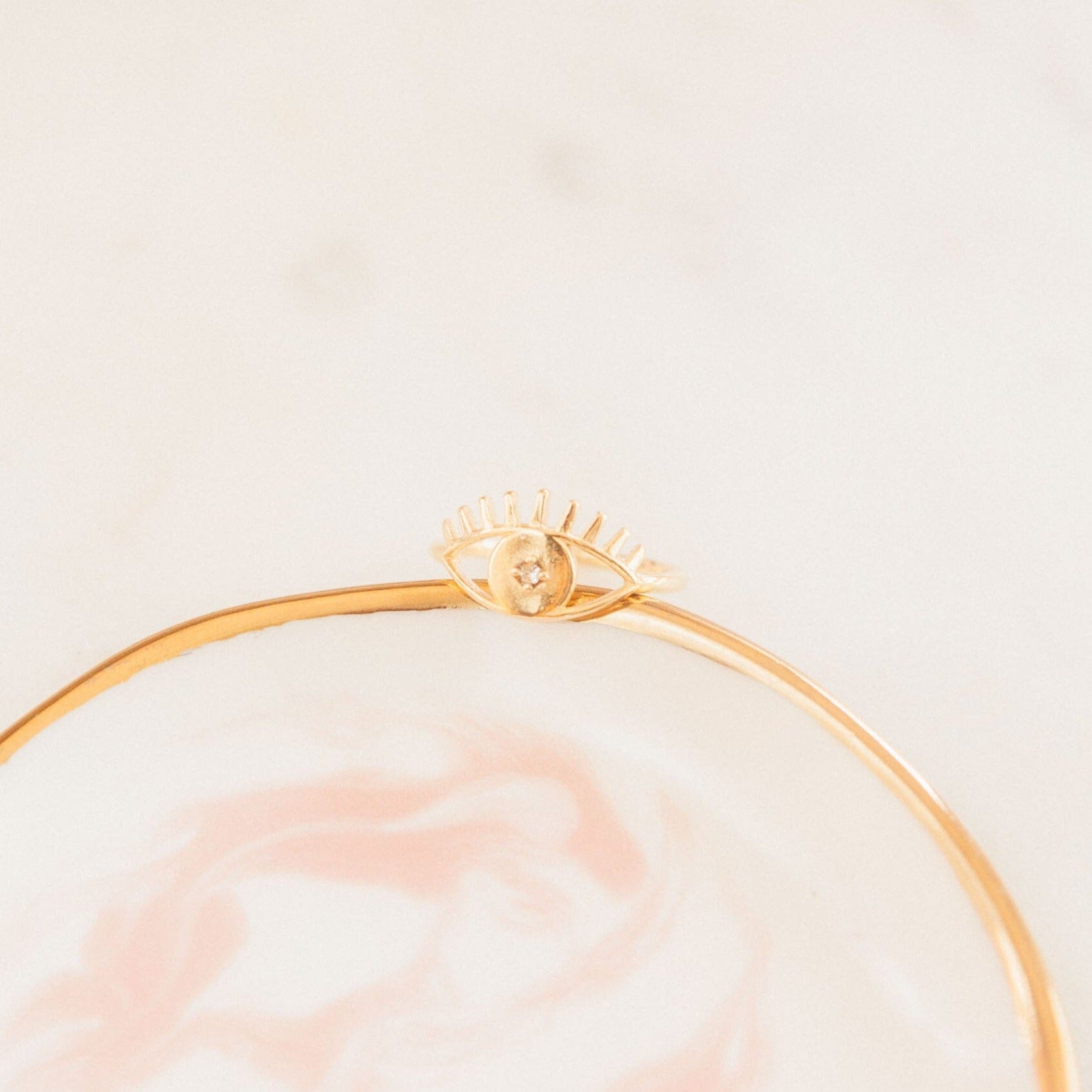 Dainty gold Evil Eye Ring made in America by Katie Dean Jewelry.