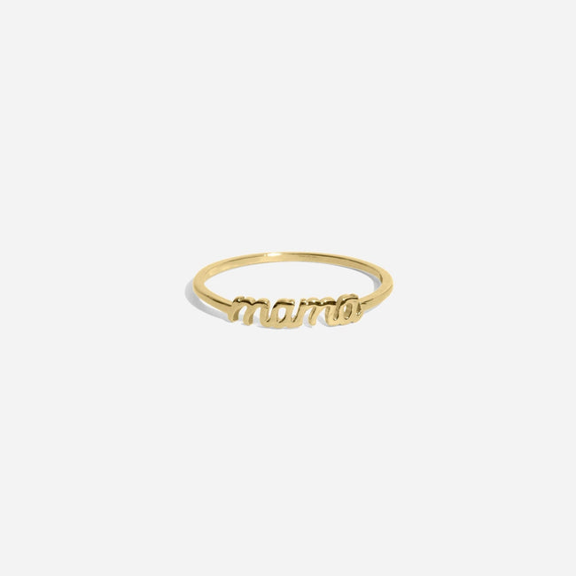 Dainty gold Mama Ring handmade in America by Katie Dean Jewelry, as seen on a natural white background, perfect for the dainty minimal jewelry lovers.