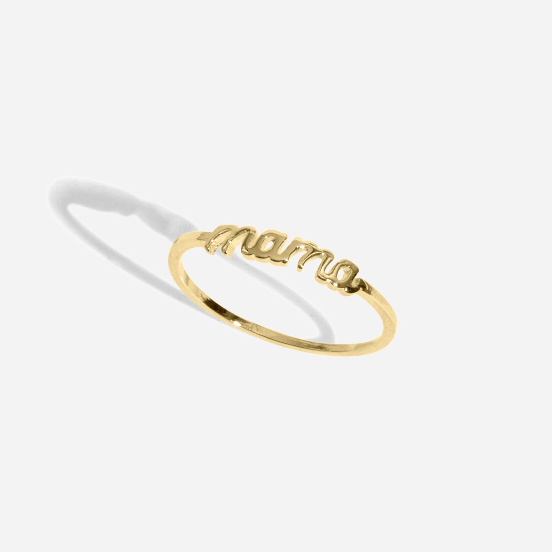 Dainty gold Mama Ring handmade in America by Katie Dean Jewelry, as seen on a natural white background, perfect for the dainty minimal jewelry lovers.