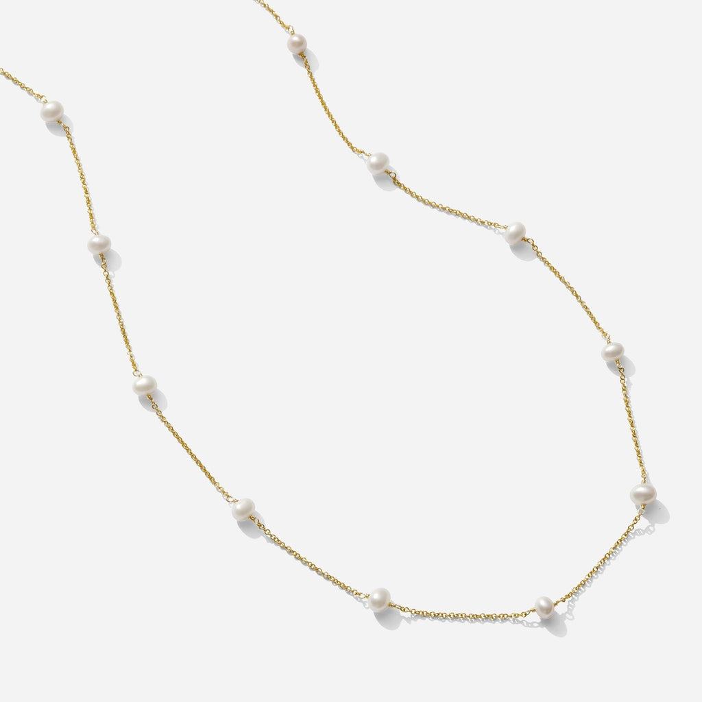 The Pearl Necklace as seen on a white background by Katie Dean Jewelry. Made in America.