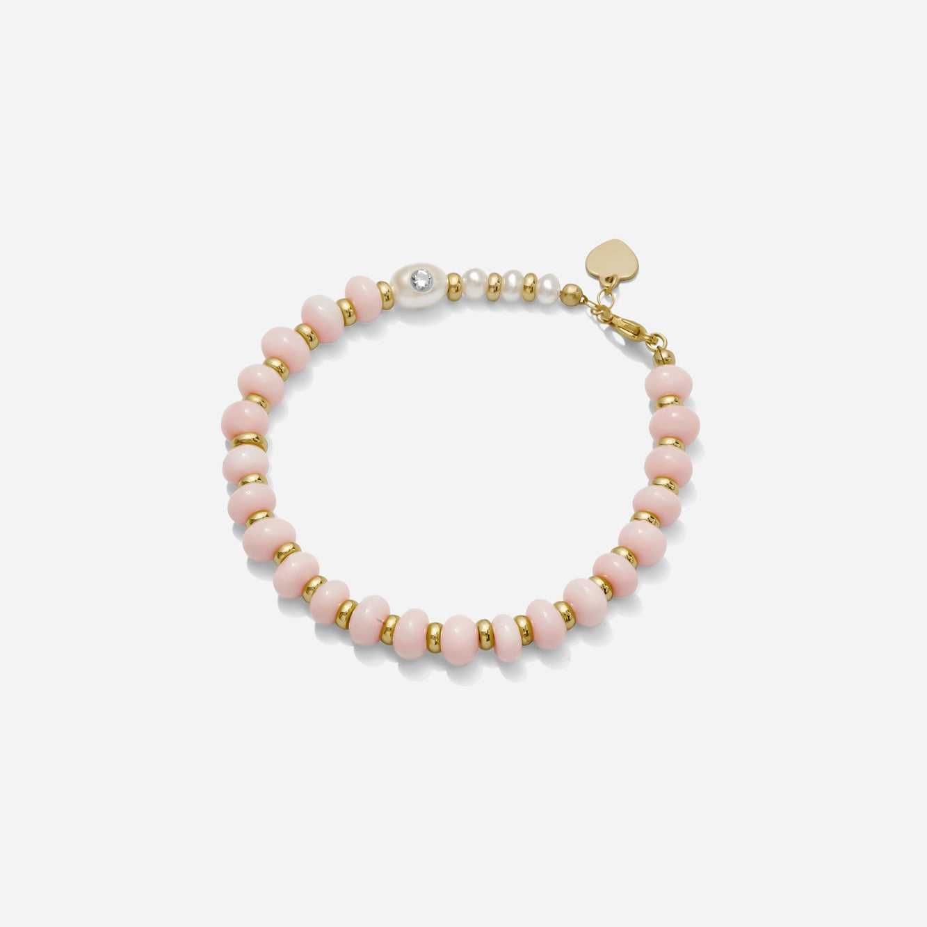 Bracelet with pink opal beads and gold beads on a white background