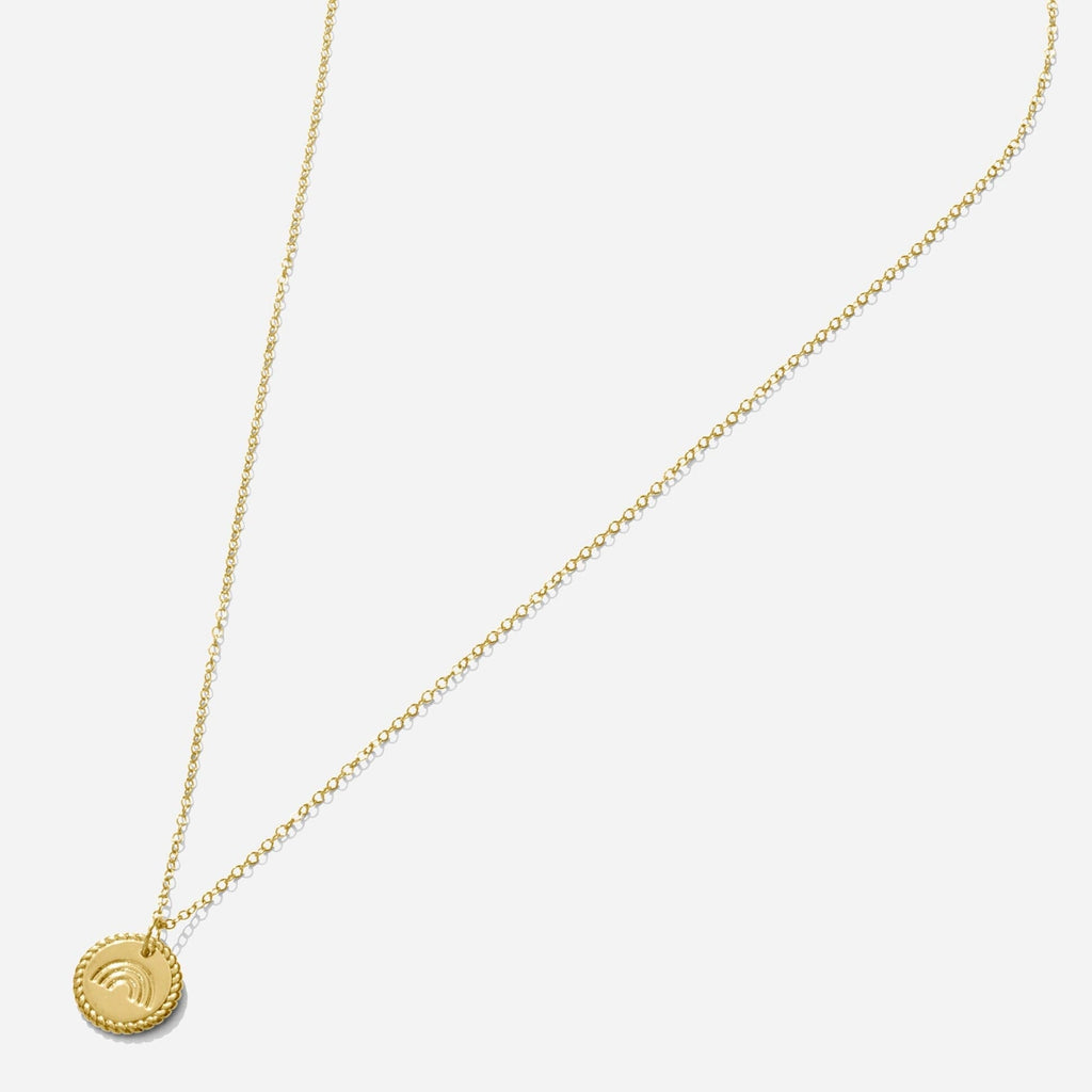 Gold Rainbow Necklace handmade in America by Katie Dean Jewelry, as seen on a natural white background, perfect for the dainty minimal jewelry lovers.