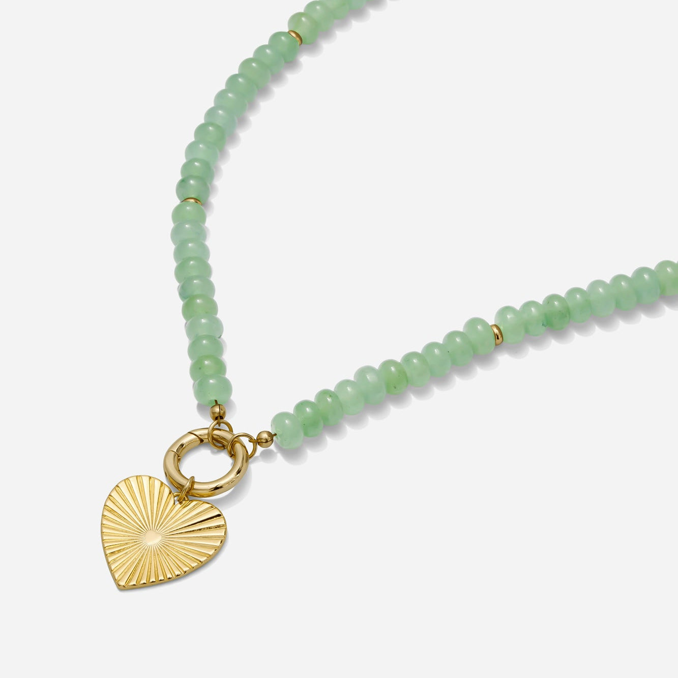 Green beaded necklace with a gold carabiner clasp and gold heart charm on a white background handmade by Katie Dean Jewelry