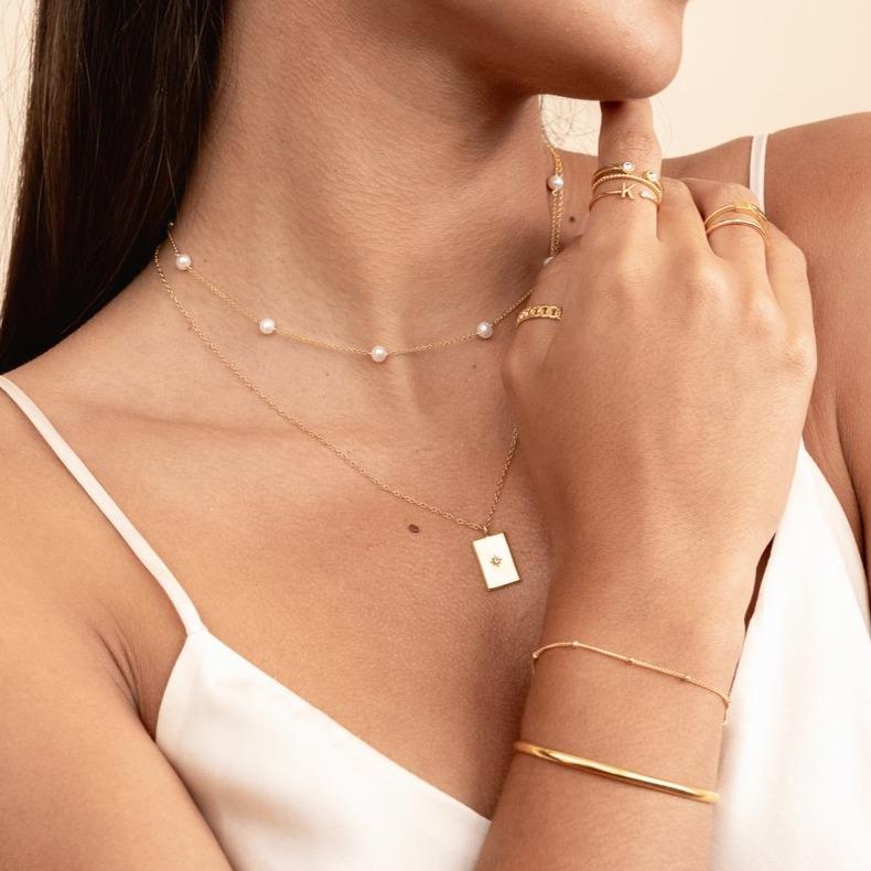 Dainty gold Beaded Bracelet and Gold Cuff by Katie Dean Jewelry, handmade in America