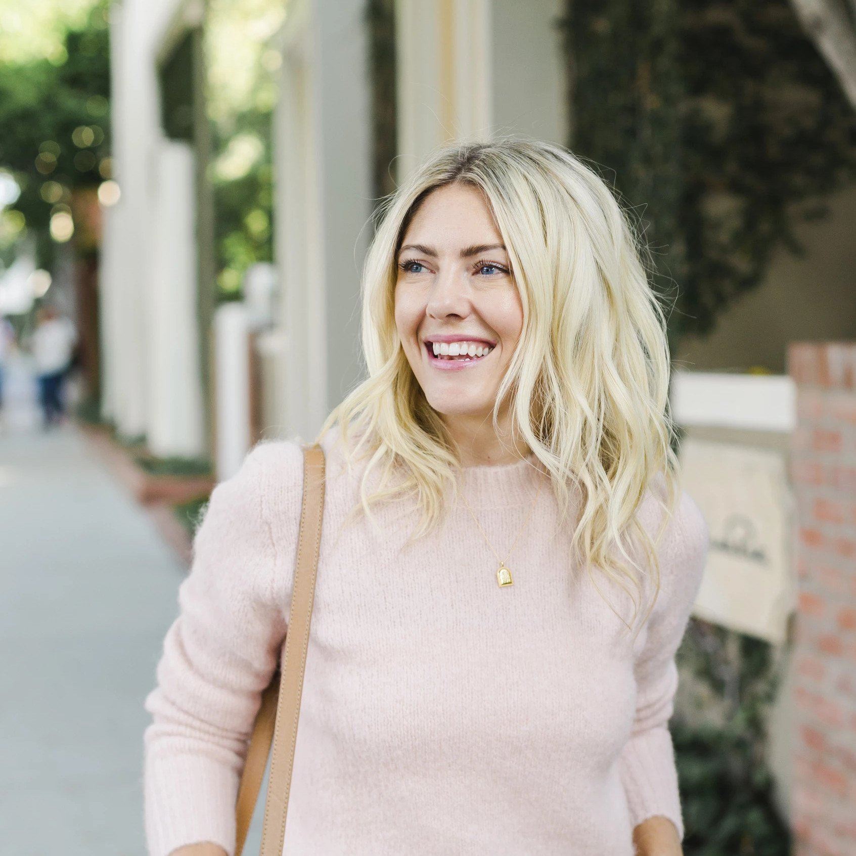 The Beaded Arch Necklace. Made as an ode to the beautiful arches in Europe. This necklace layers perfectly with the Beaded Coin Necklace. Handmade in California by Katie Dean Jewelry.