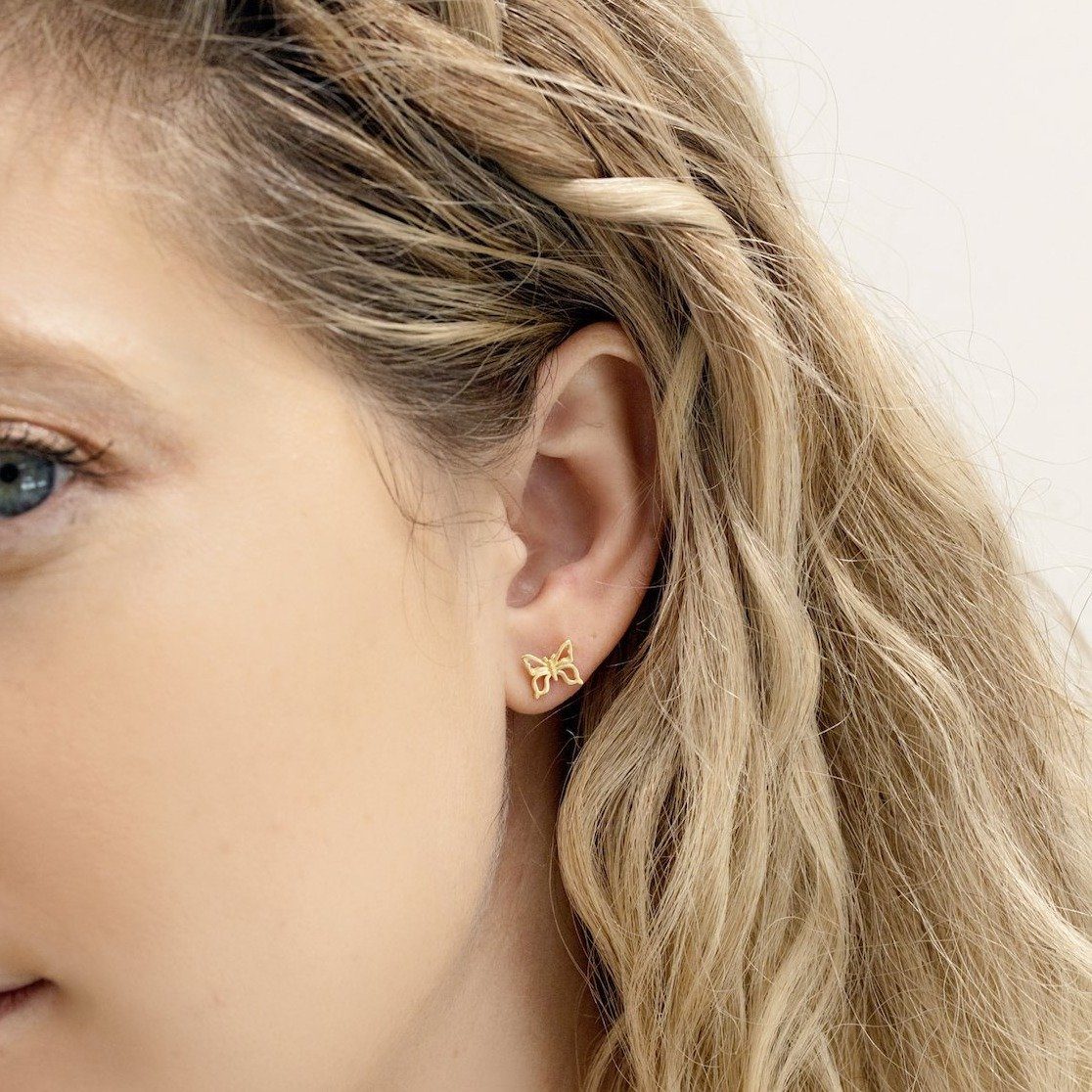 Butterfly Stud Earrings as shown on a model, by Katie Dean Jewelry handmade in California