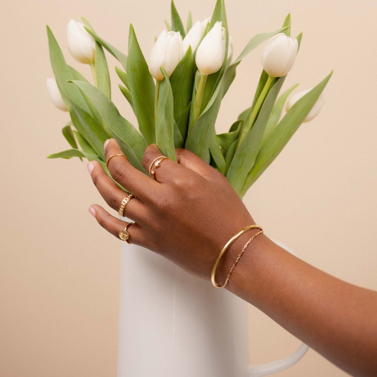 Dainty gold bracelets featuring the Linked Bracelet and Claw cuff Bracelet, Classic Bracelet Set handmade by Katie Dean Jewelry