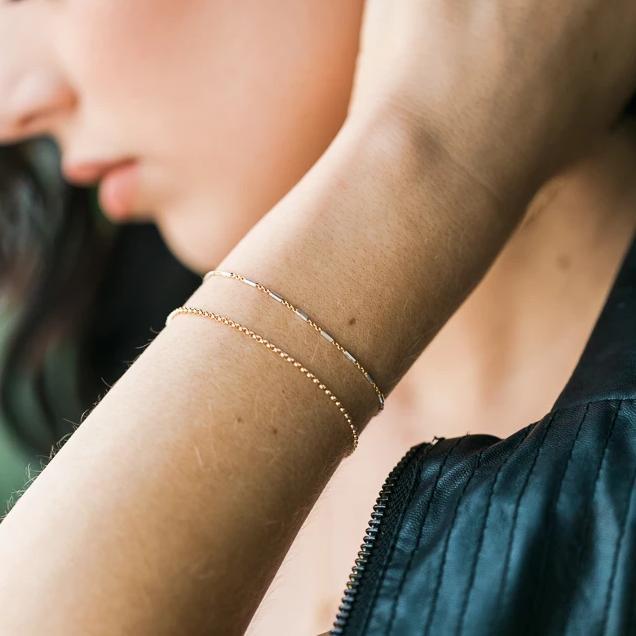 Silver and gold came together to form the perfect friendship in the form of this dainty bracelet. Silver and gold lovers alike agree on this one! Handmade in California by Katie Dean Jewelry.