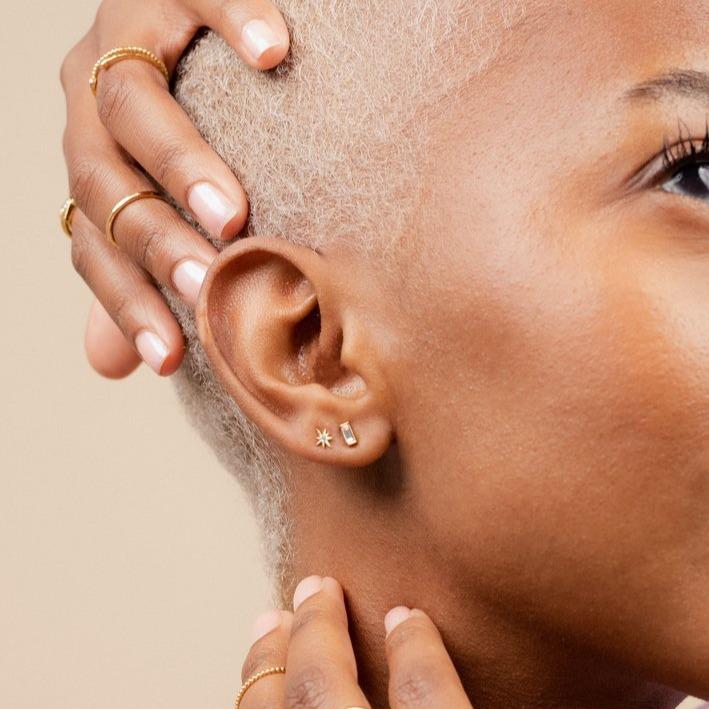 Model wearing the Golden Earring Set, Baguette Little Dipper Studs Katie Dean Jewelry