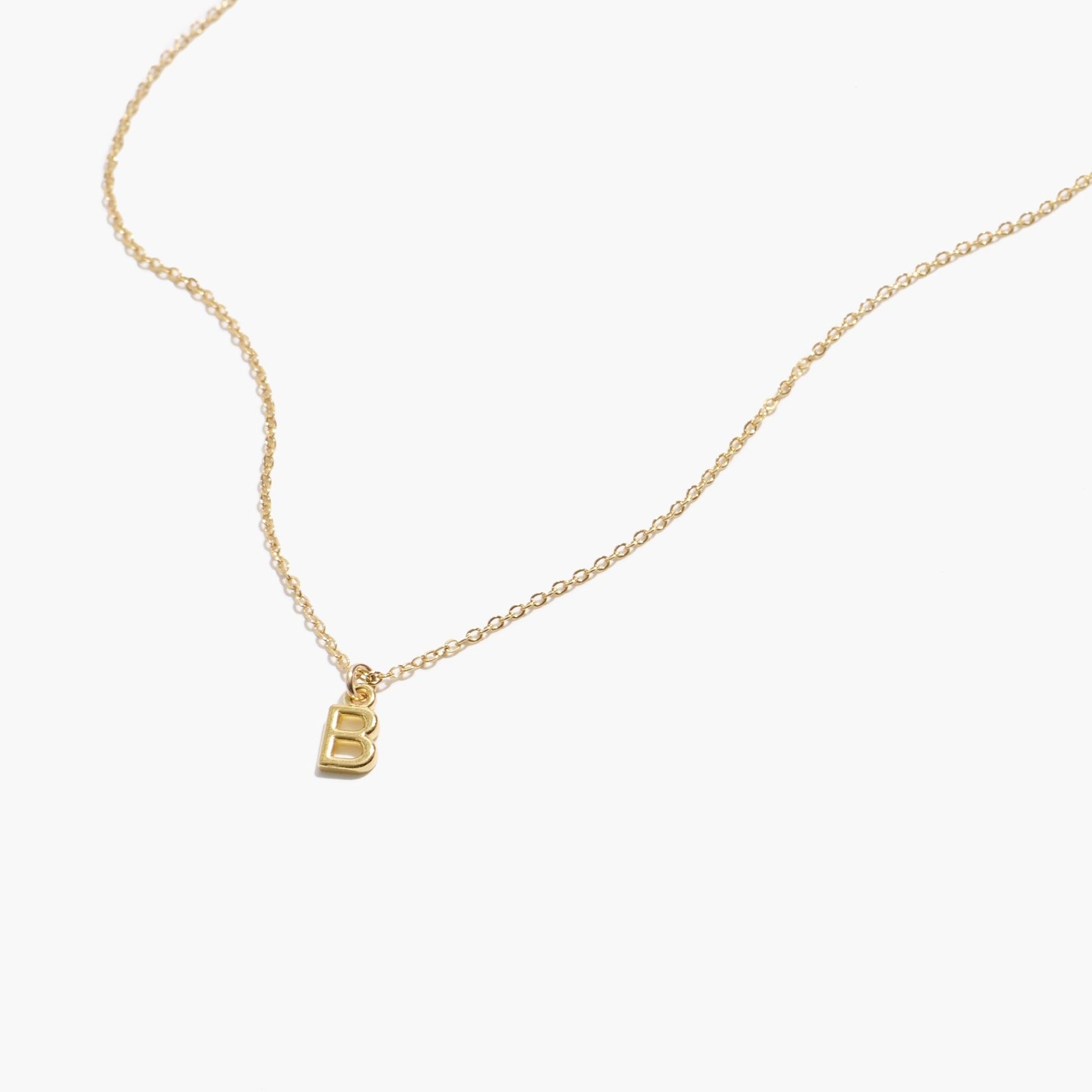 Delicate Initial Necklace, the perfect personalized piece. Minimal layering jewelry handmade in America by Katie Dean Jewelry.
