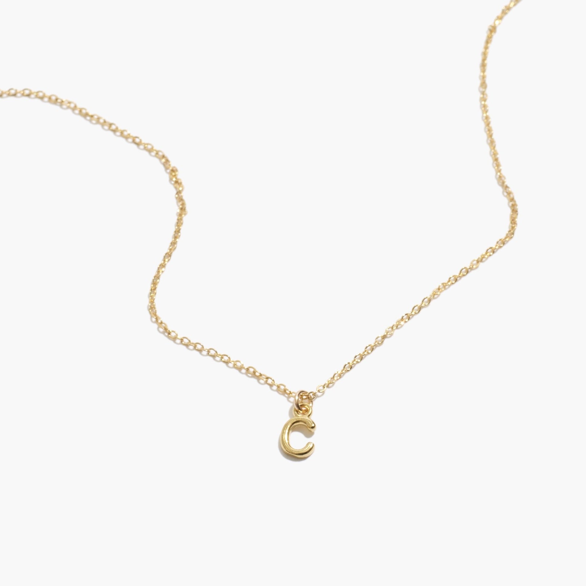 Delicate Initial Necklace, the perfect personalized piece. Minimal layering jewelry handmade in America by Katie Dean Jewelry.