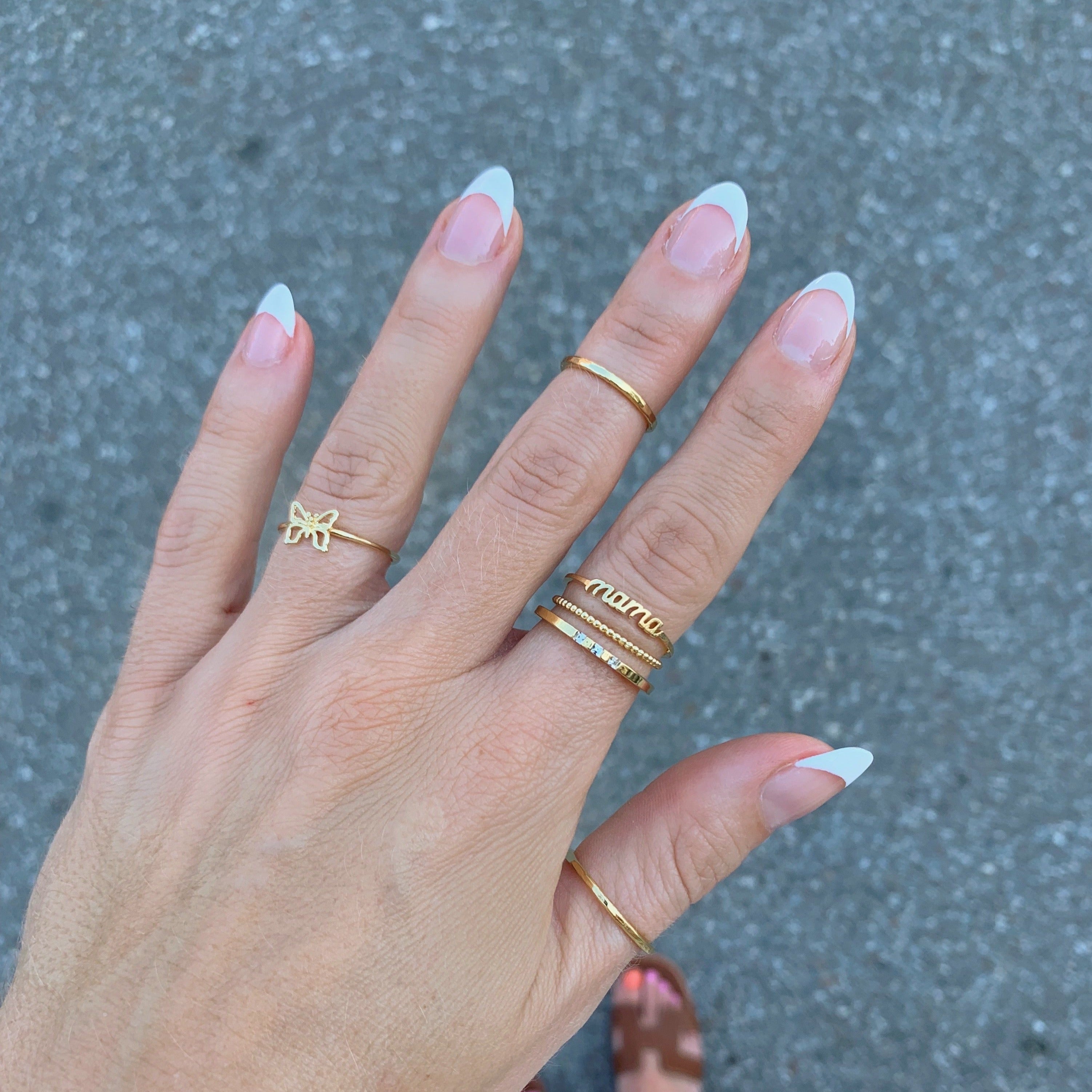 Dainty, minimal Mama Ring, it’s the stacking ring perfect for Mother’s day and handmade in America by Katie Dean Jewelry