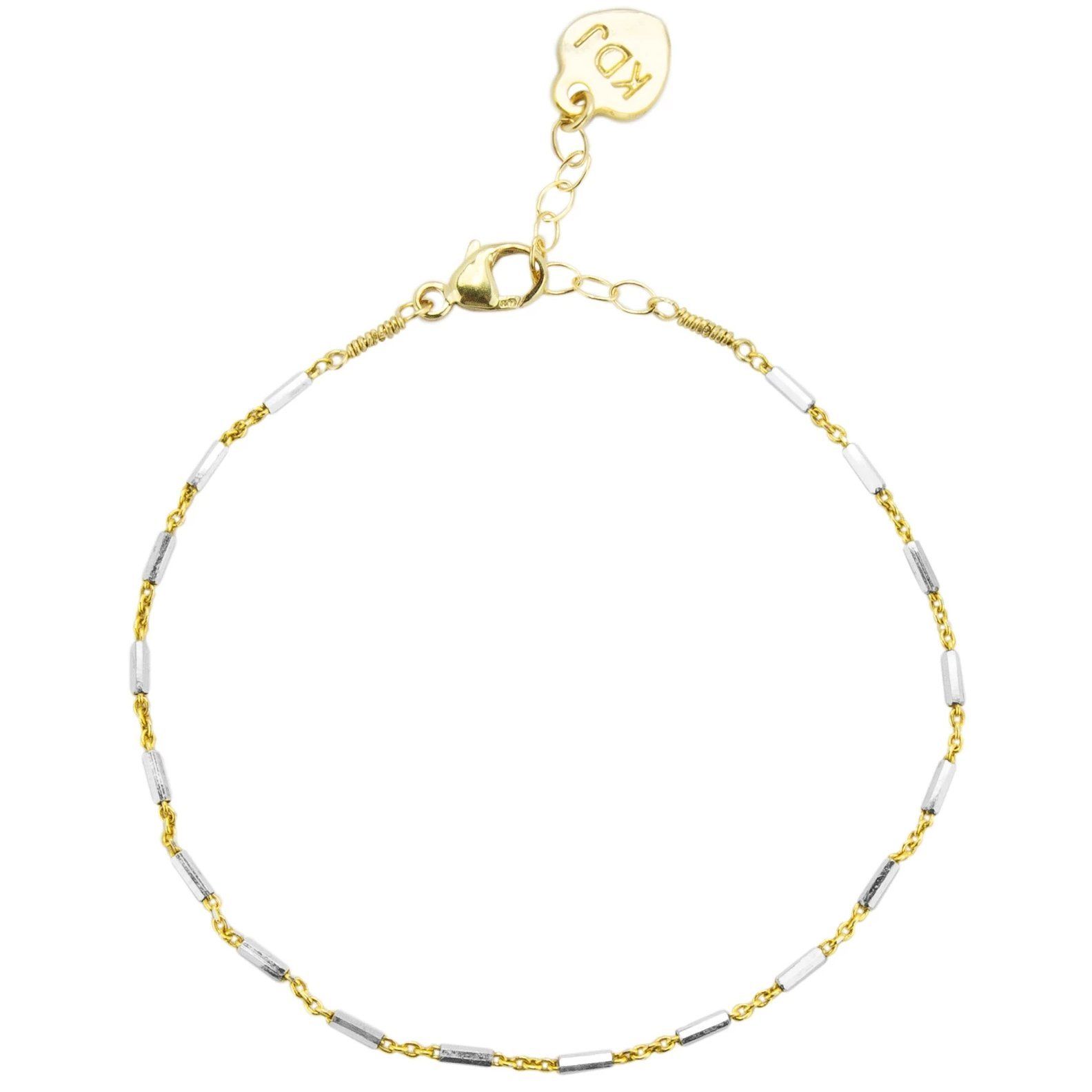 Silver and gold came together to form the perfect friendship in the form of this dainty bracelet. Silver and gold lovers alike agree on this one!  Handmade in California by Katie Dean Jewelry.