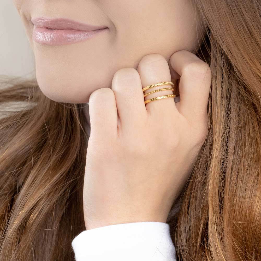 Simple with a side of detail. The textures within each ring included in this ring stack makes for an eye catching set while staying true to a minimalist nature. Handmade in California by Katie Dean Jewelry.