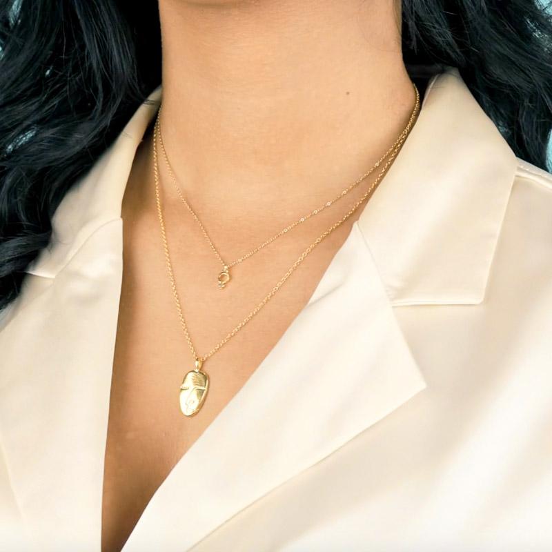 The Girl Power Necklace Set. This set includes the Female Symbol Necklace & Artist Face Necklace. Handmade in California by Katie Dean Jewelry.