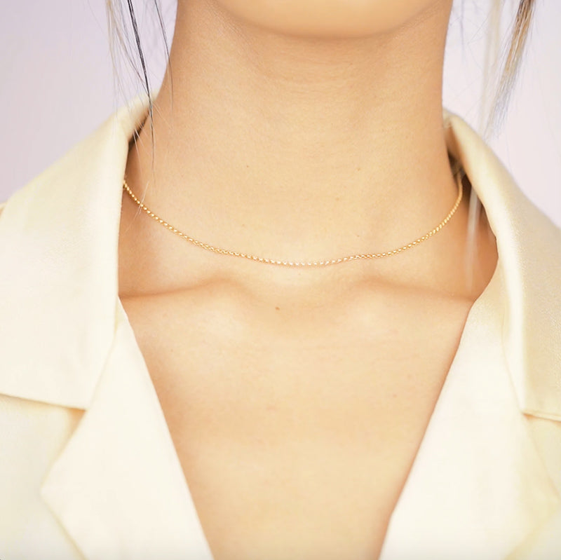 The Gold Rolo Choker Necklace, to the point, but anything except boring. Truly for every type of woman and perfectly pairs with any jewelry! A basic everyone should own. Handmade in California by Katie Dean Jewelry.