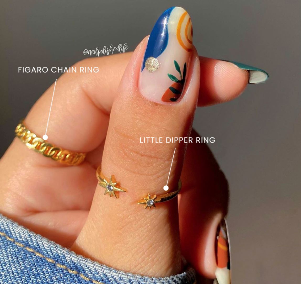 Dainty gold Figaro Chain Ring and Little Dipper Star Ring perfect for the minimalist, handmade in America by Katie Dean Jewelry paired with an abstract manicure by Nail Polished Life