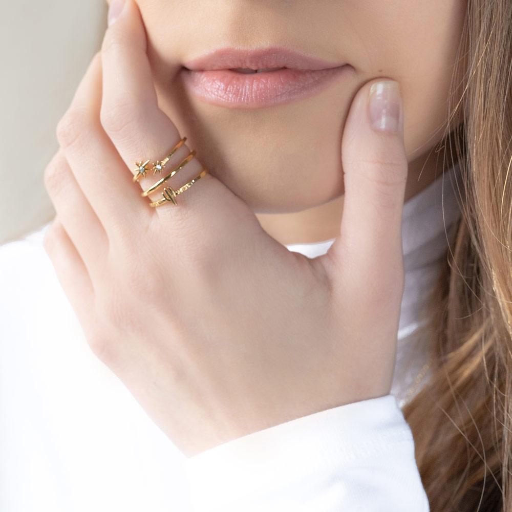 Woman wearing Katie Dean Jewelry Desert Stack.