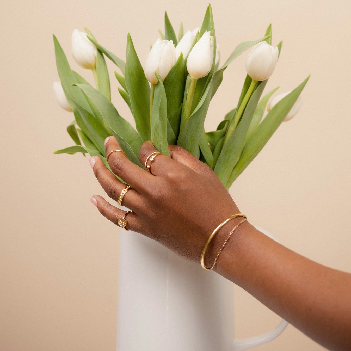 Dainty gold bracelets featuring the Linked Bracelet and Claw cuff Bracelet, Classic Bracelet Set handmade in America by Katie Dean Jewelry