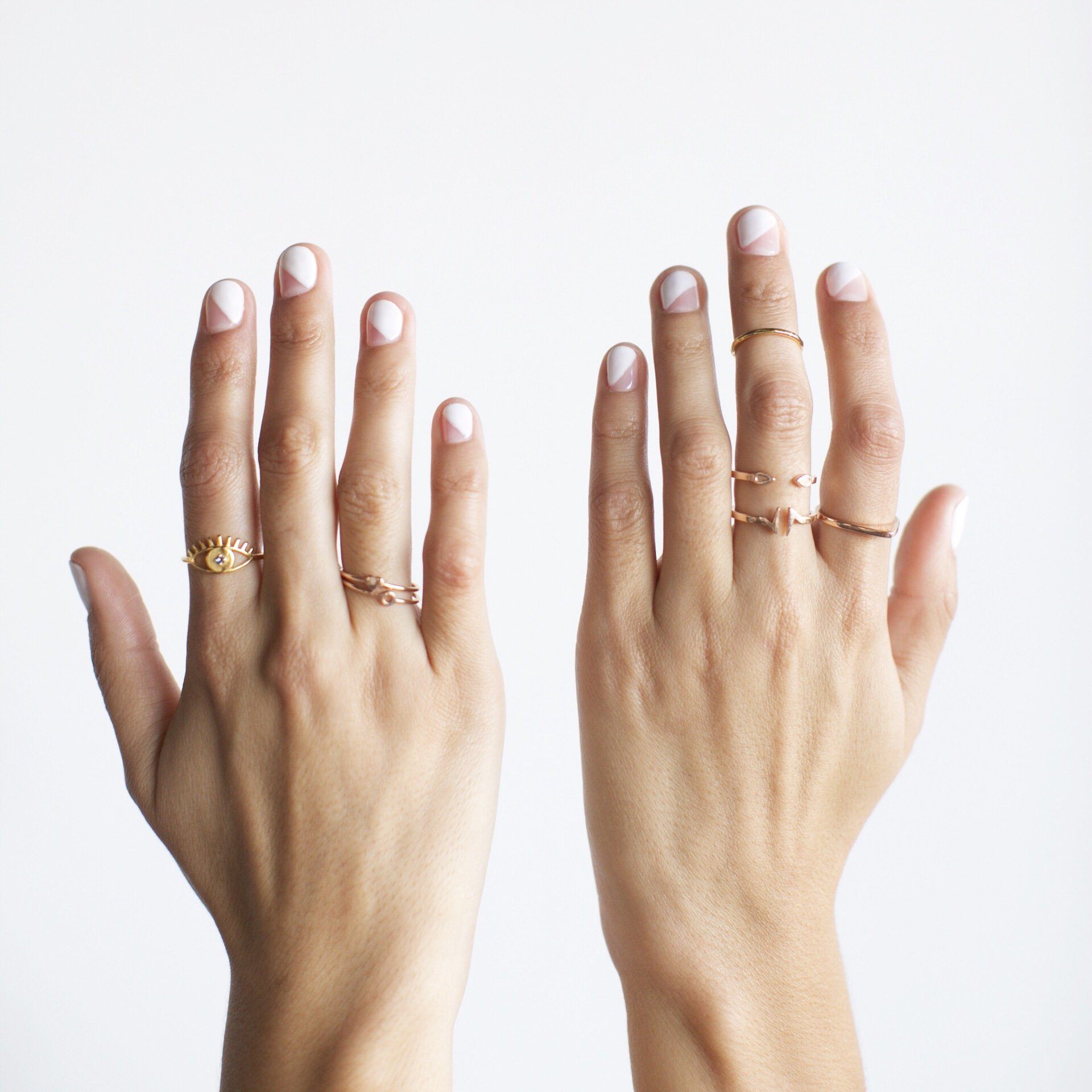 Katie Dean hand Model wearing rings on each hand.