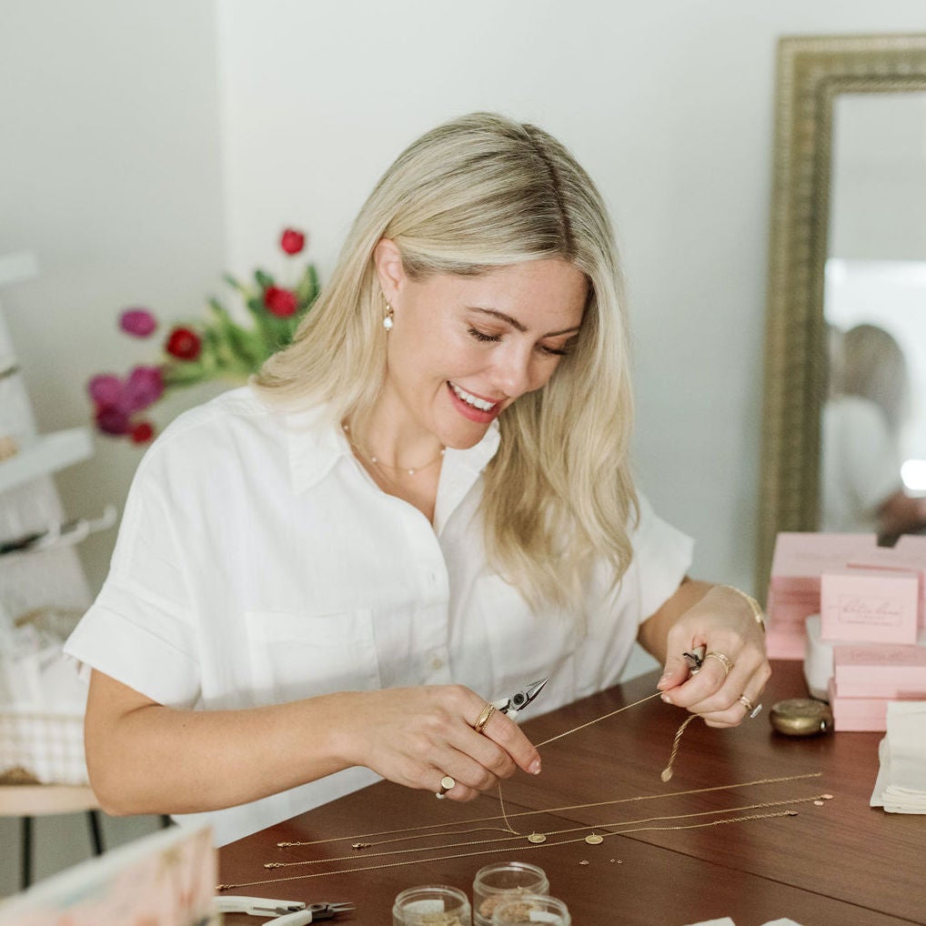 Katie Dean, designer and founder of dainty gold jewelry line, Katie Dean Jewelry, handmade in America