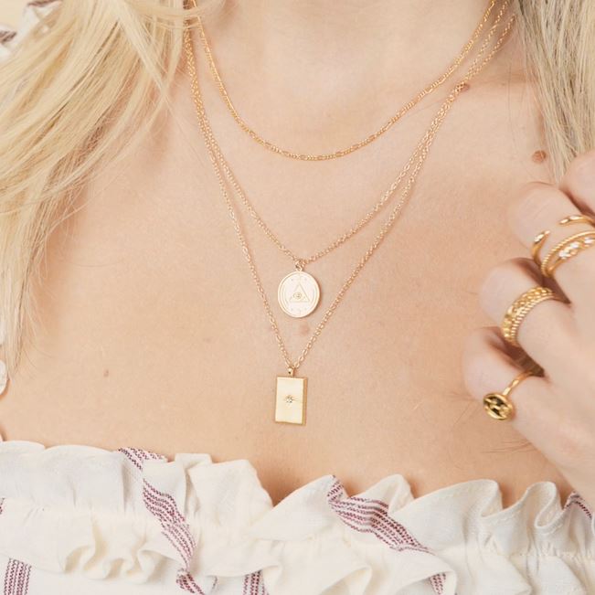 Dainty layered look by Katie Dean Jewelry. All pieces handmade in California.