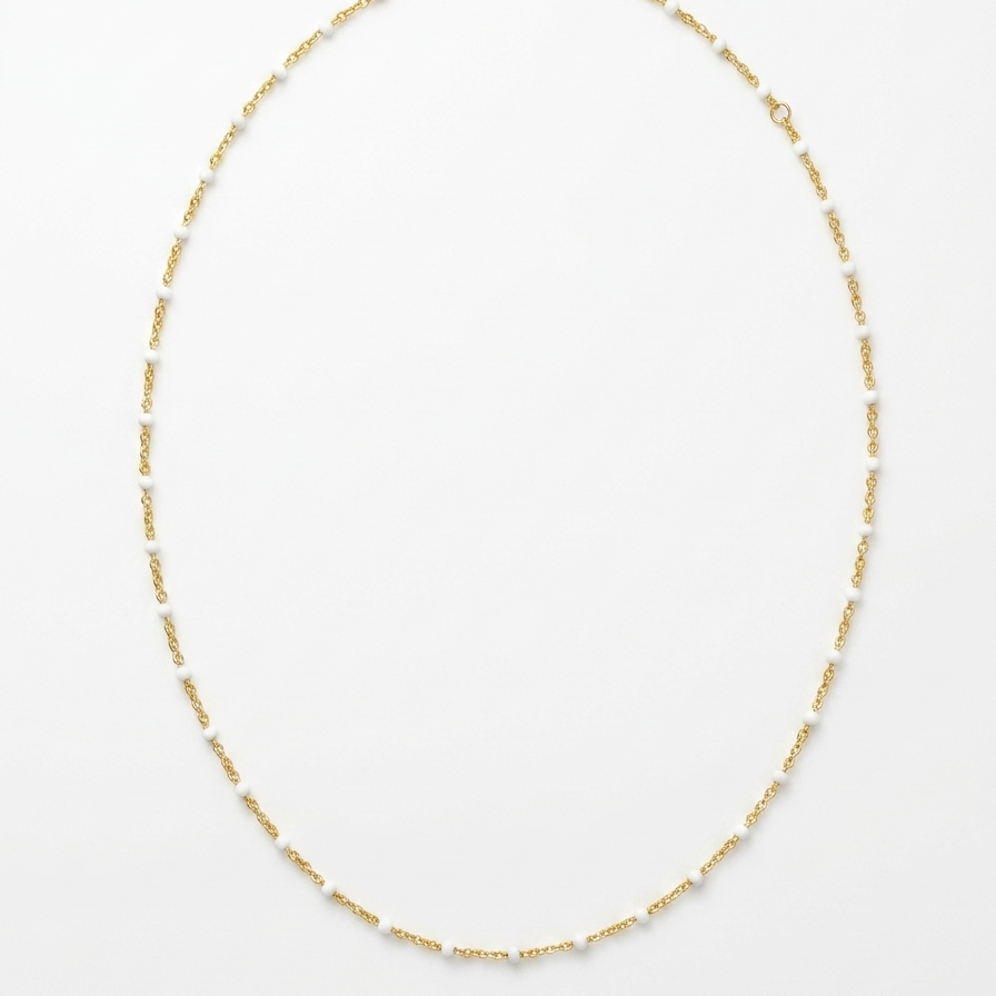Gold enamel chain necklace with white enamel beads made by Katie Dean Jewelry