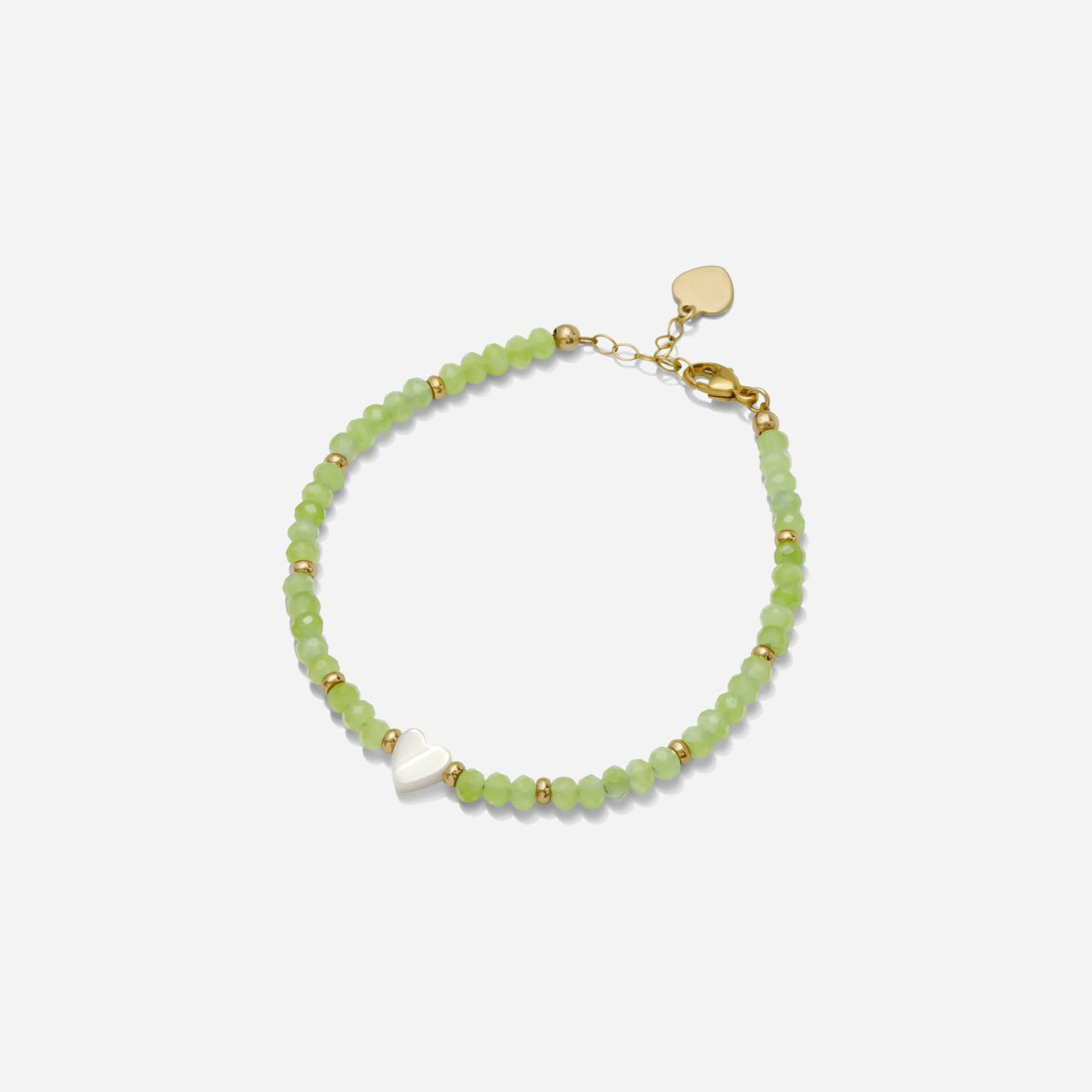 Green peridot semi precious gemstone beaded bracelet with gold fill bead accents and a dainty white pearl heart charm on a white background, handmade by Katie Dean Jewelry in Clearwater, Florida.