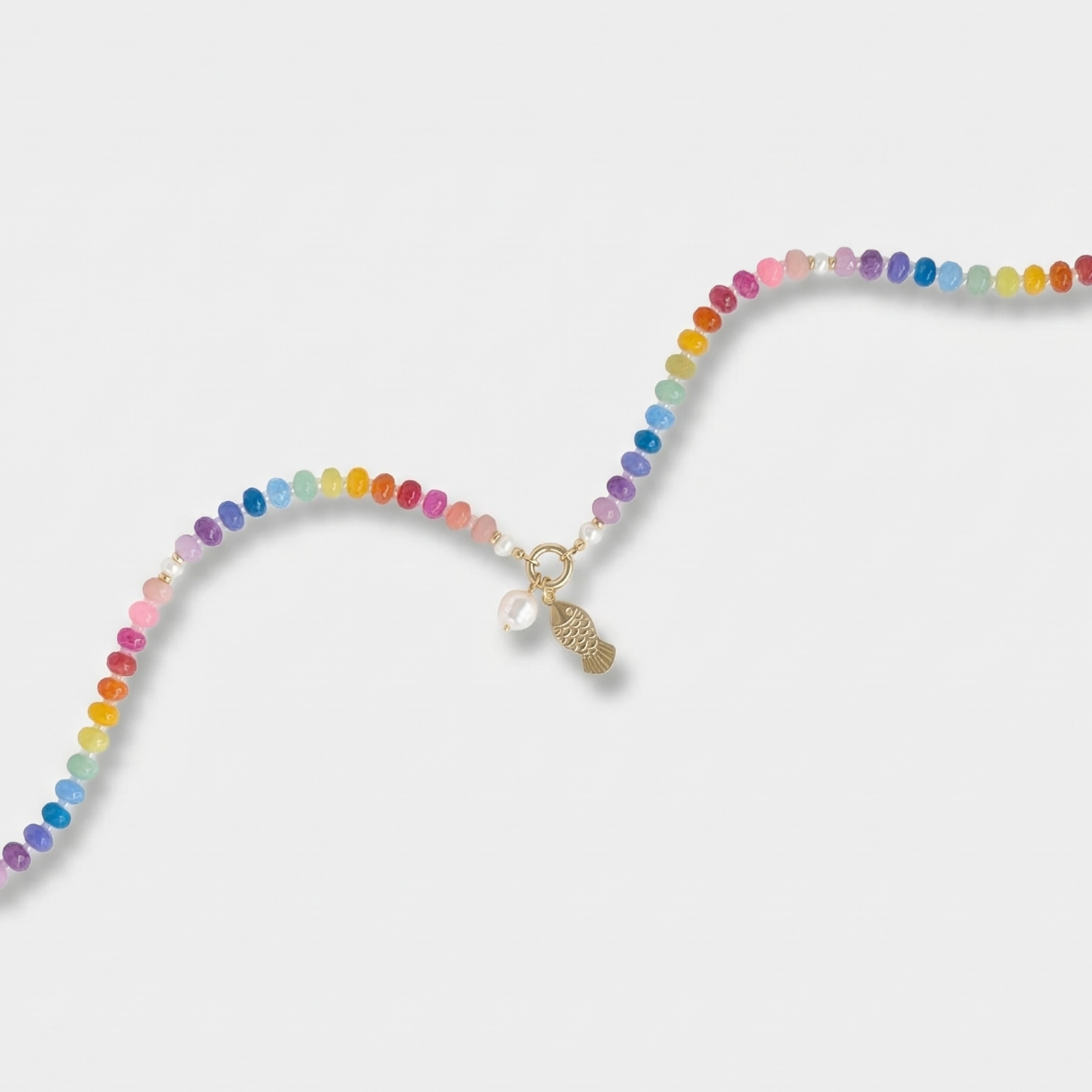 Multicolored beaded necklace on a white background