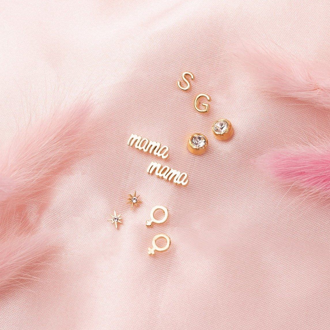 Dainty gold Mama Stud Earrings by Katie dean Jewelry, along with Initial Earrings, Birthstone Earrings, Little Dipper star stud earrings, and female symbol stud earrings