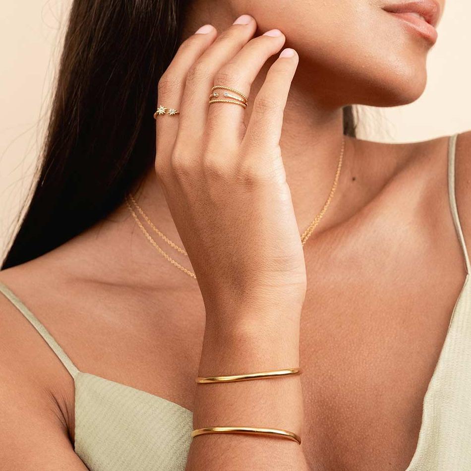 The Claw Cuff as seen on a model. It's perfect for the minimalist who wants to make a statement. Handmade in California by Katie Dean Jewelry.
