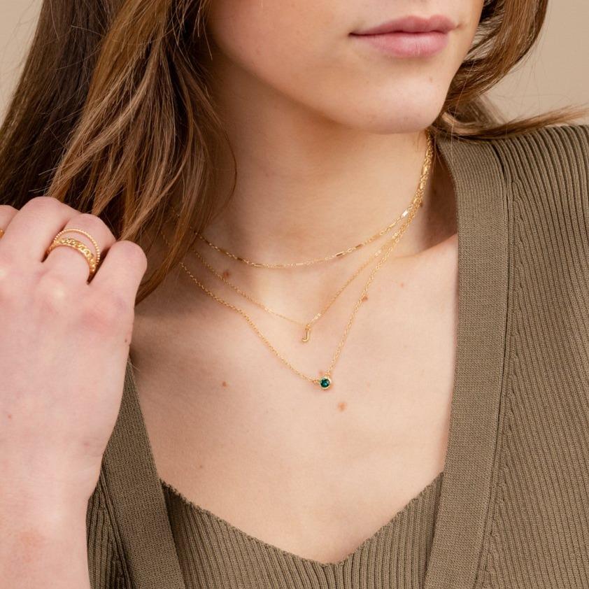 Model wearing the dainty gold Birthstone Necklace, Linked Choker, Initial Necklace, handmade in America by Katie Dean Jewelry