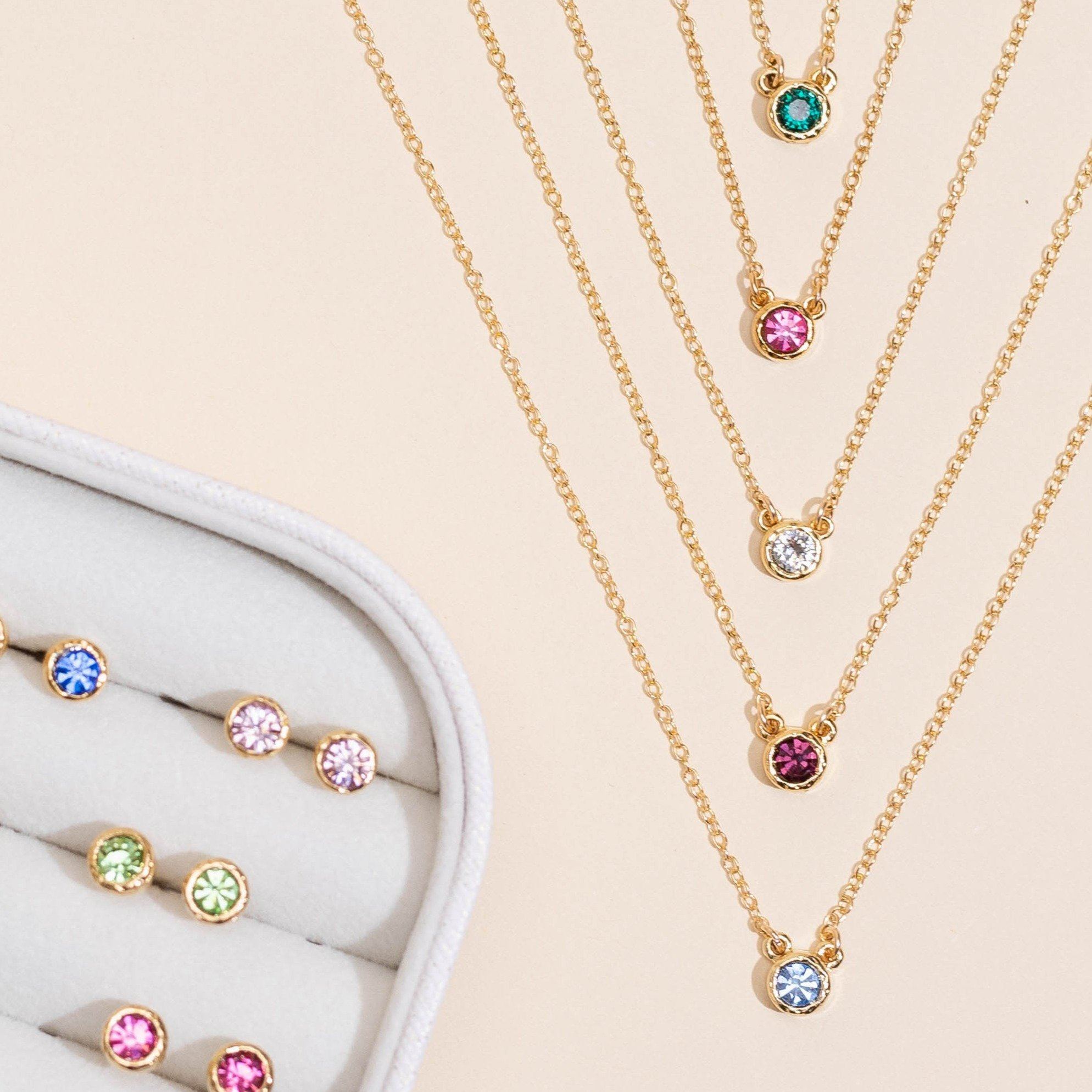 Dainty gold Birthstone Necklaces and Birthstone Studs handmade in America by Katie Dean Jewelry