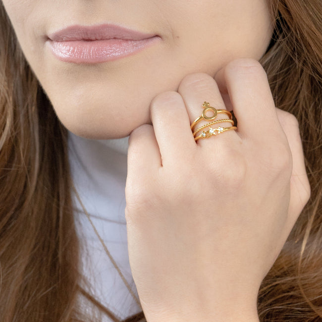 Wear your feminism loud and proud with the Feminist Stack. After all, women are pure magic. This stack includes: Starburst Ring, Beaded Ring, Female Symbol Ring. Handmade in California by Katie Dean Jewelry.