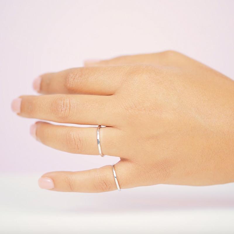 The Hammered Band Rings are clean cut with a little edge that's all in the detail! Say hello to the perfect stacking ring, a great addition to your daily ring stack.