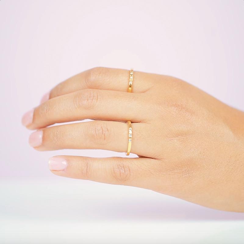 Three is never a crowd with this delicate and sparkly ring. Mix and match this ring to with your other stacking rings to create the perfect stack. Handmade in California by Katie Dean Jewelry.
