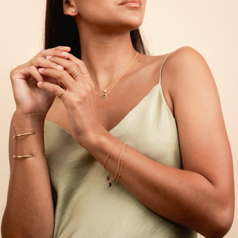 Dainty gold bracelets featuring the Linked Bracelet and Gold Rolo Bracelet, minimal bracelet set handmade by Katie Dean Jewelry
