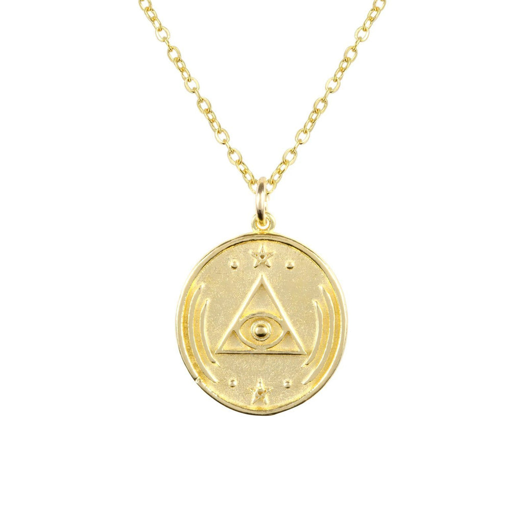 Gold and dainty All Seeing Eye Necklace against a white background, circular in shape with a triangle and eye design in the middle of the charm.  